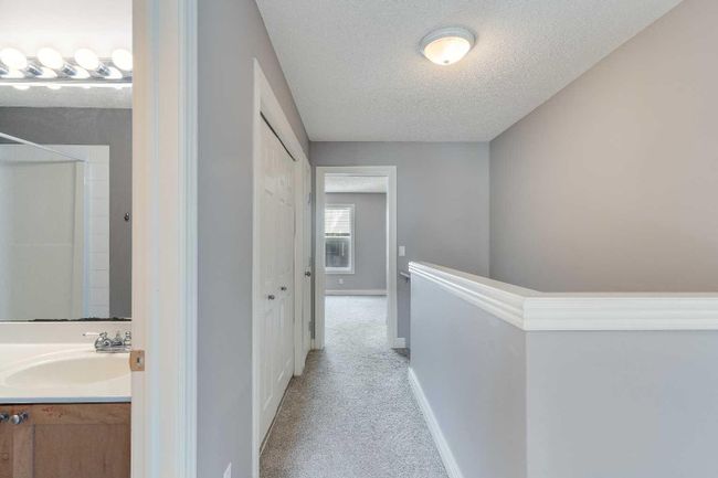 135 Bridlewood View Sw, Home with 4 bedrooms, 2 bathrooms and 3 parking in Calgary AB | Image 14