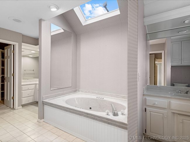 Tub with skylight upstairs bathroom 3 | Image 44