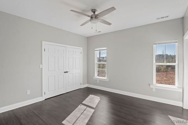 2nd bedroom with natural lighting, ceiling fan, LVP flooring and jack and jill bathroom | Image 15
