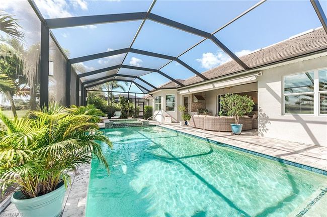 Expanded lanai cage with pool and spa | Image 44