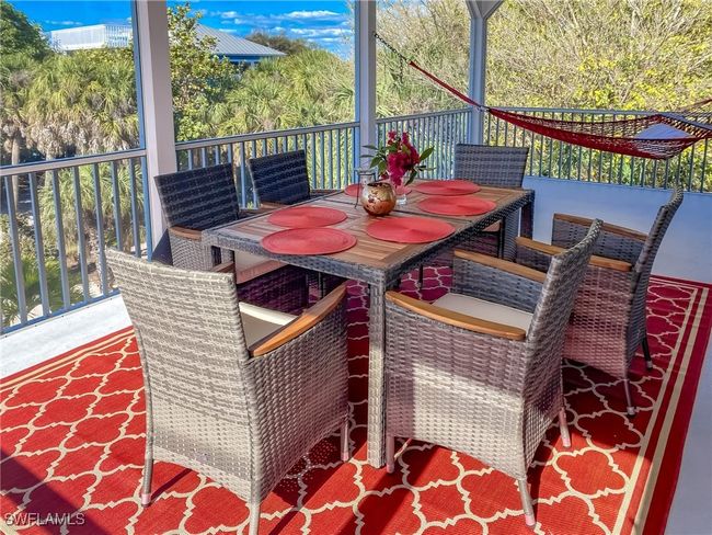 Deck with outdoor dining area | Image 28