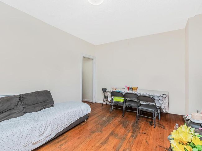 Bedroom featuring wood finished floors | Image 4
