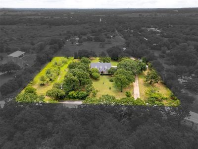 Cape cod home featuring a front yard | Image 1