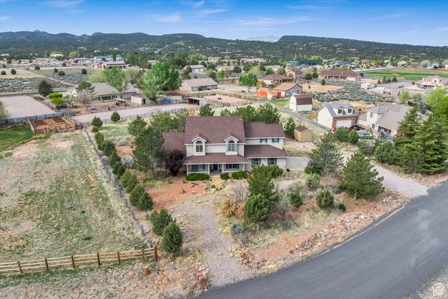 Drone / aerial view featuring a residential view and a mountain view | Image 12
