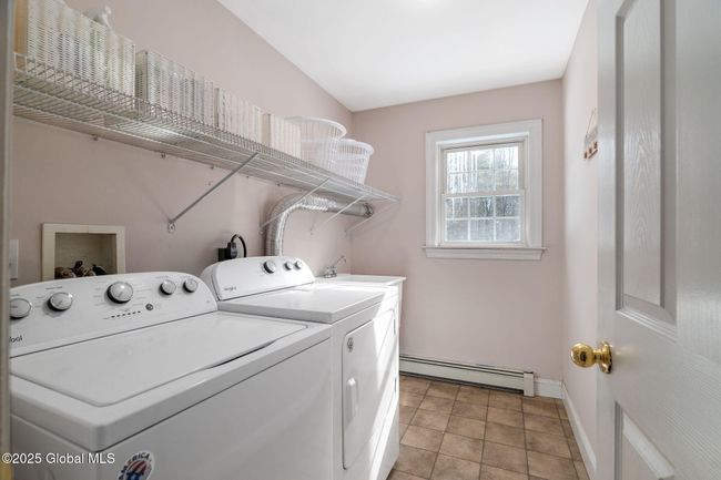 2nd Floor Laundry Room featuring Large Wash Sink and shelving | Image 34