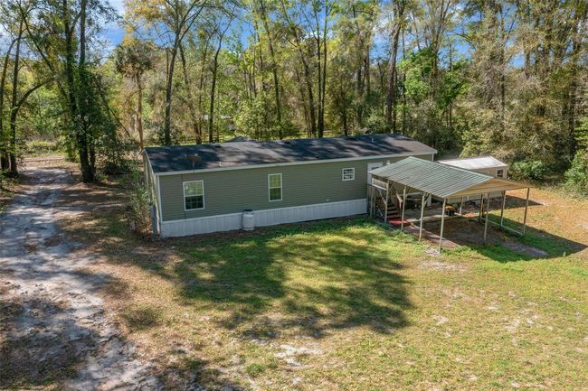 2005 Ne 185 Th St, House other with 3 bedrooms, 2 bathrooms and null parking in CITRA FL | Image 71