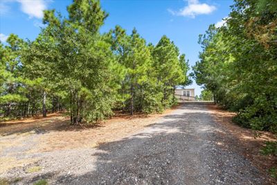 Home sits on a Hill Top with good Circular Driveway Access and Egress | Image 1