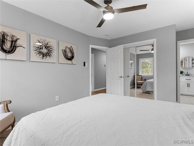 Bedroom with a closet, a sink, and a ceiling fan | Image 25