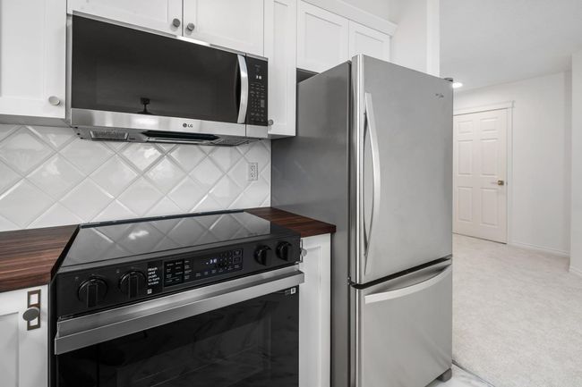 2205 - 7451 Springbank Blvd Sw, Condo with 2 bedrooms, 2 bathrooms and 1 parking in Calgary AB | Image 14