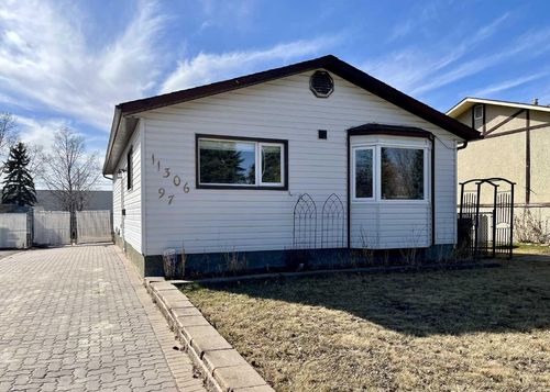 11306 97 Street, Home with 4 bedrooms, 2 bathrooms and 2 parking in Grande Prairie AB | Card Image