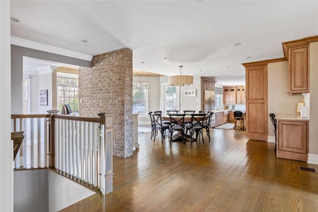 Dining room featuring visible vents, recessed lighting, dark wood-type flooring, and crown molding | Image 12