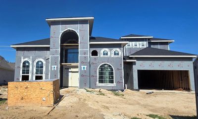 13807 Martingale Pointe - Venetian 4. Cultured stone and Stucco exterior. This home promises to be s show-stopper! | Image 2