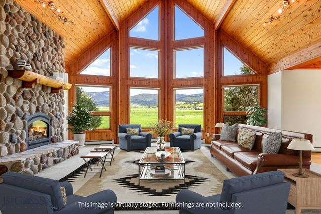 Living area. This image has been virtually staged. | Image 9