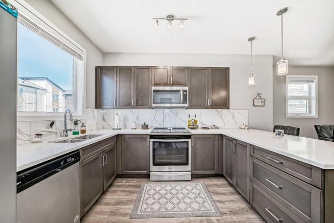 247 Redstone Boulevard Ne, Home with 3 bedrooms, 2 bathrooms and 3 parking in Calgary AB | Image 7