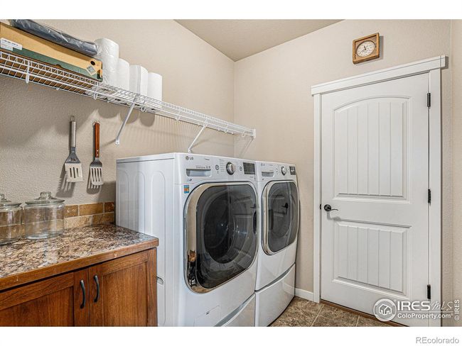 laundry room off attached garage | Image 17