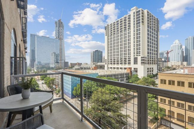 Balcony featuring a view of city | Image 14