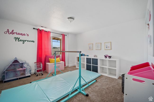 Bedroom featuring visible vents, baseboards, and carpet floors | Image 19