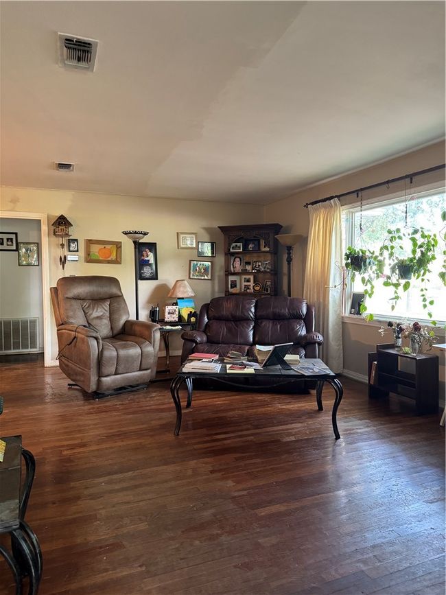 Living area featuring hardwood / wood-style flooring | Image 10