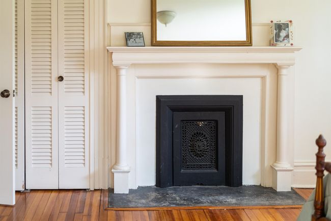 Even though the current owners have never used this fireplace, it adds so much ambiance to the room. | Image 49