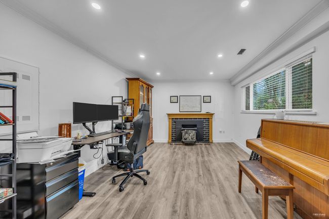 Office space featuring ornamental molding, recessed lighting, and light wood finished floors | Image 4