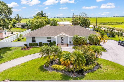 1073 Se 3rd St, Belle Glade, FL, 33430-4321 | Card Image