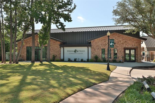 The Spring Trails Community Center is the heart of the neighborhood, offering a clubhouse, meeting spaces, and a variety of organized events for all ages. Surrounded by parks, walking trails, and recreational facilities, it’s the perfect spot to connect with neighbors and enjoy community activities. | Image 31