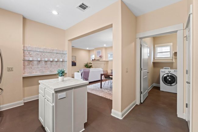 The kitchen is just open enough to the rest of the downstairs, but offers a bit of separation. | Image 20
