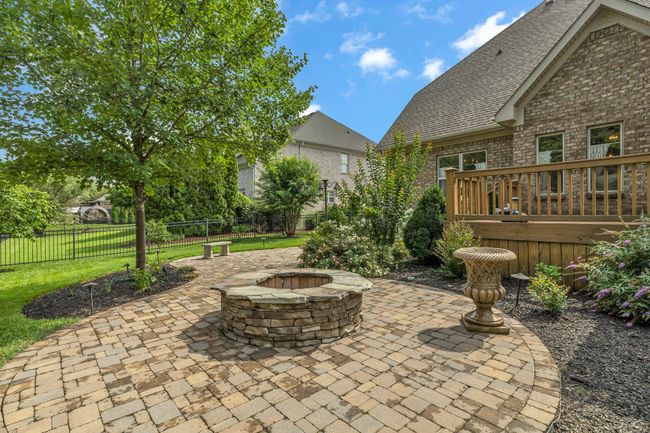 This impeccable patio is massive and has a variety of options for use. | Image 45