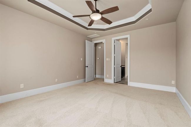 Another view of the primary bedroom looking towards the ensuite bath. | Image 22