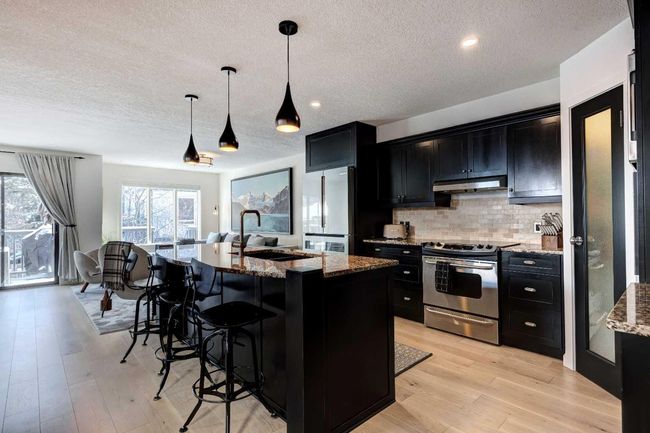 B - 116 Otter, Home with 5 bedrooms, 4 bathrooms and 3 parking in Banff AB | Image 7