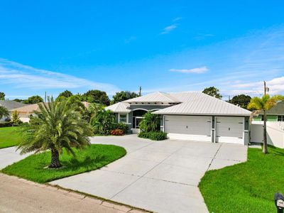 3453 Se Hart Circle, House other with 4 bedrooms, 3 bathrooms and null parking in Port St Lucie FL | Image 3