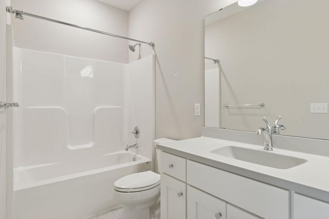 A unique floor plan with a full bath serving the 2nd bedroom and guests on the main level | Image 32