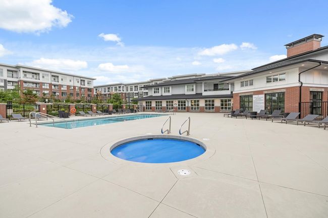 Community pool featuring fence and a patio | Image 36