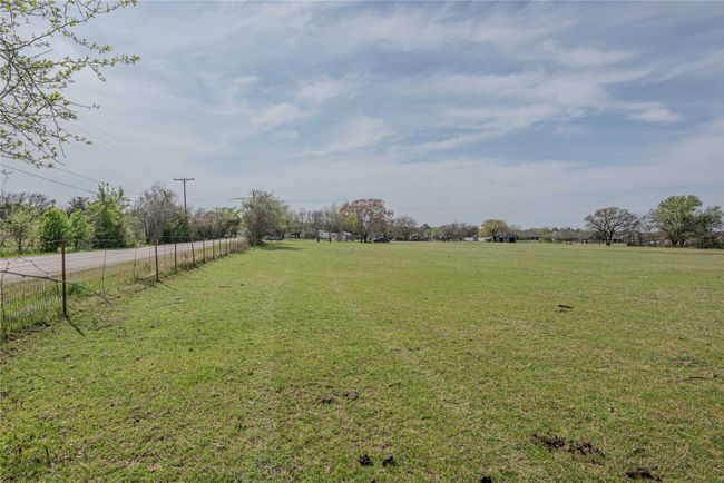 View of yard with fence and a rural view | Image 32