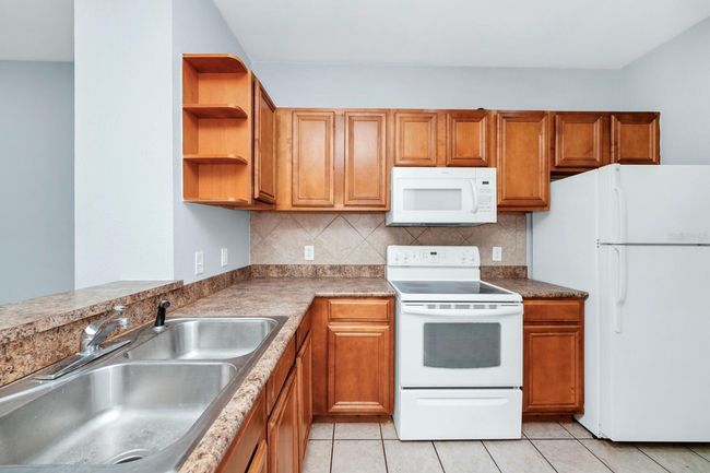 UNIT-106 - 6157 Metrowest Blvd, Condo with 2 bedrooms, 2 bathrooms and null parking in ORLANDO FL | Image 13