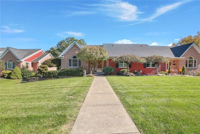 Single family, attached home... yet NO HOA fees! | Image 1