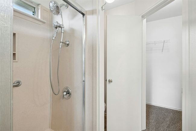 Bathroom featuring a walk in shower | Image 17
