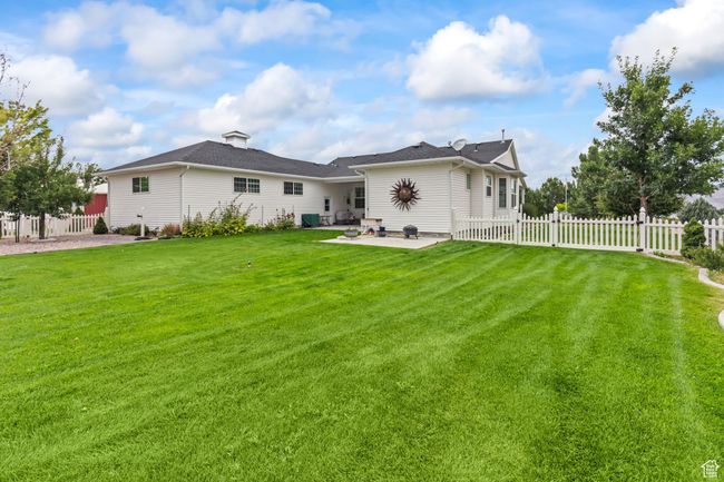 Rear view of house featuring a patio | Image 89