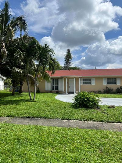 436 Baker Drive, House other with 5 bedrooms, 3 bathrooms and null parking in West Palm Beach FL | Image 2