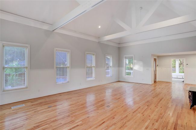 GREAT ROOM AGAIN LEADING TO KITCHEN AND BACK DOOR. | Image 19