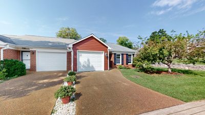 900 Glenmary Ct is tucked away in a private court towards the back of The Cloister at St Henry, a 55+ community in the West Meade/Belle Meade Highlands area. | Image 1