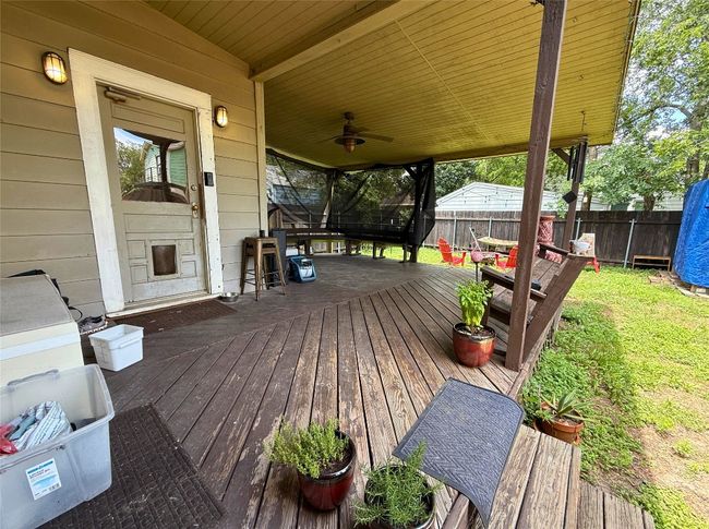 Wooden deck featuring a fenced backyard and ceiling​​‌​​​​‌​​‌‌​‌‌​​​‌‌​​‌‌​‌​​​​​‌ fan | Image 15