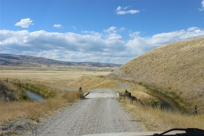 Main road as it crosses the irrigation ditch going from upper bench to lower level | Image 6