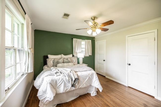 This room has hardwood flooring and nice natural light. | Image 51