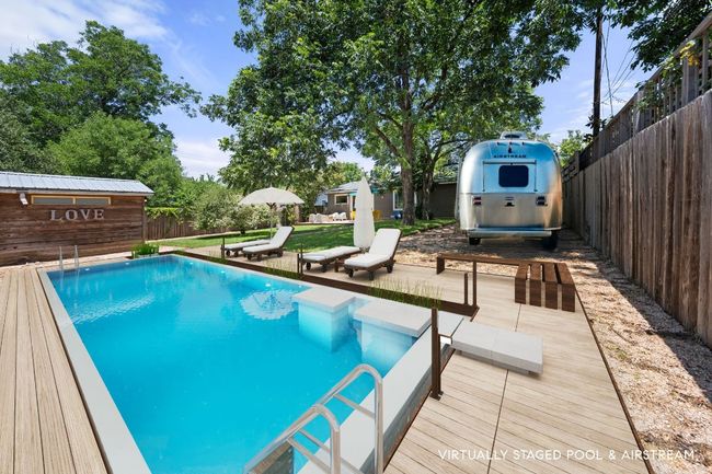 Virtually staged to show a pool and airstream! | Image 24