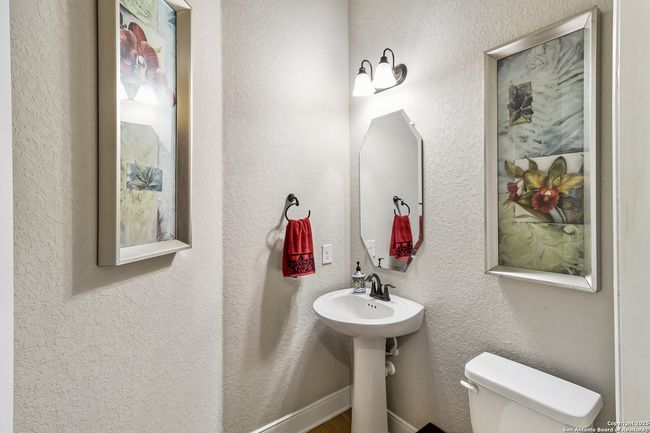 A convenient and stylish half bath, perfect for gu | Image 41
