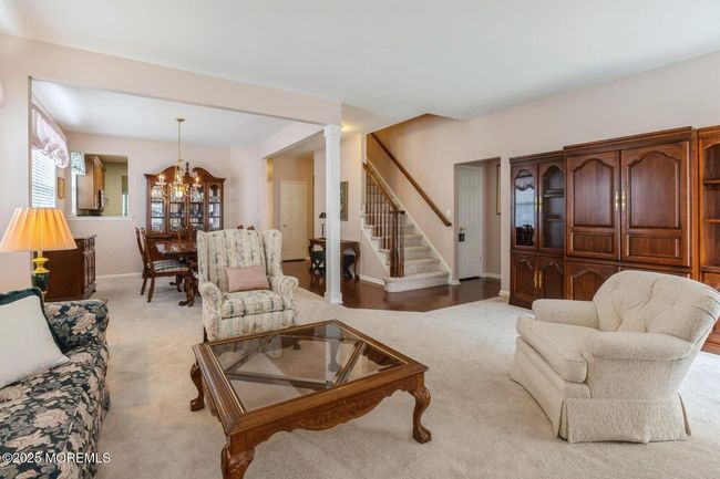 Flowing floor plan offers defined rooms. | Image 4
