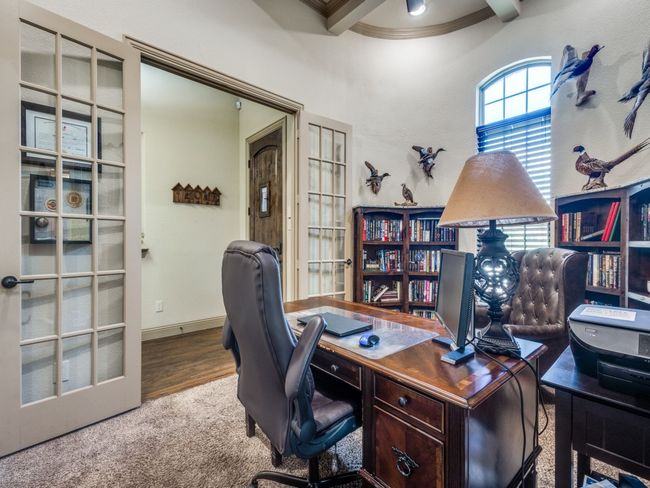 Bedroom or Study with crown molding, wood finished floors, and beam ceiling | Image 4