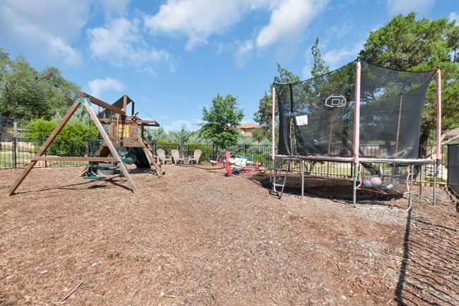 View of play area with a trampoline | Image 37