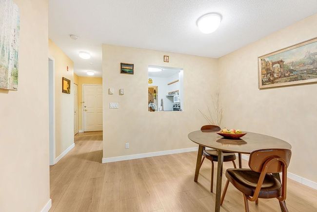 Dining space featuring light wood-style floors and baseboards | Image 14